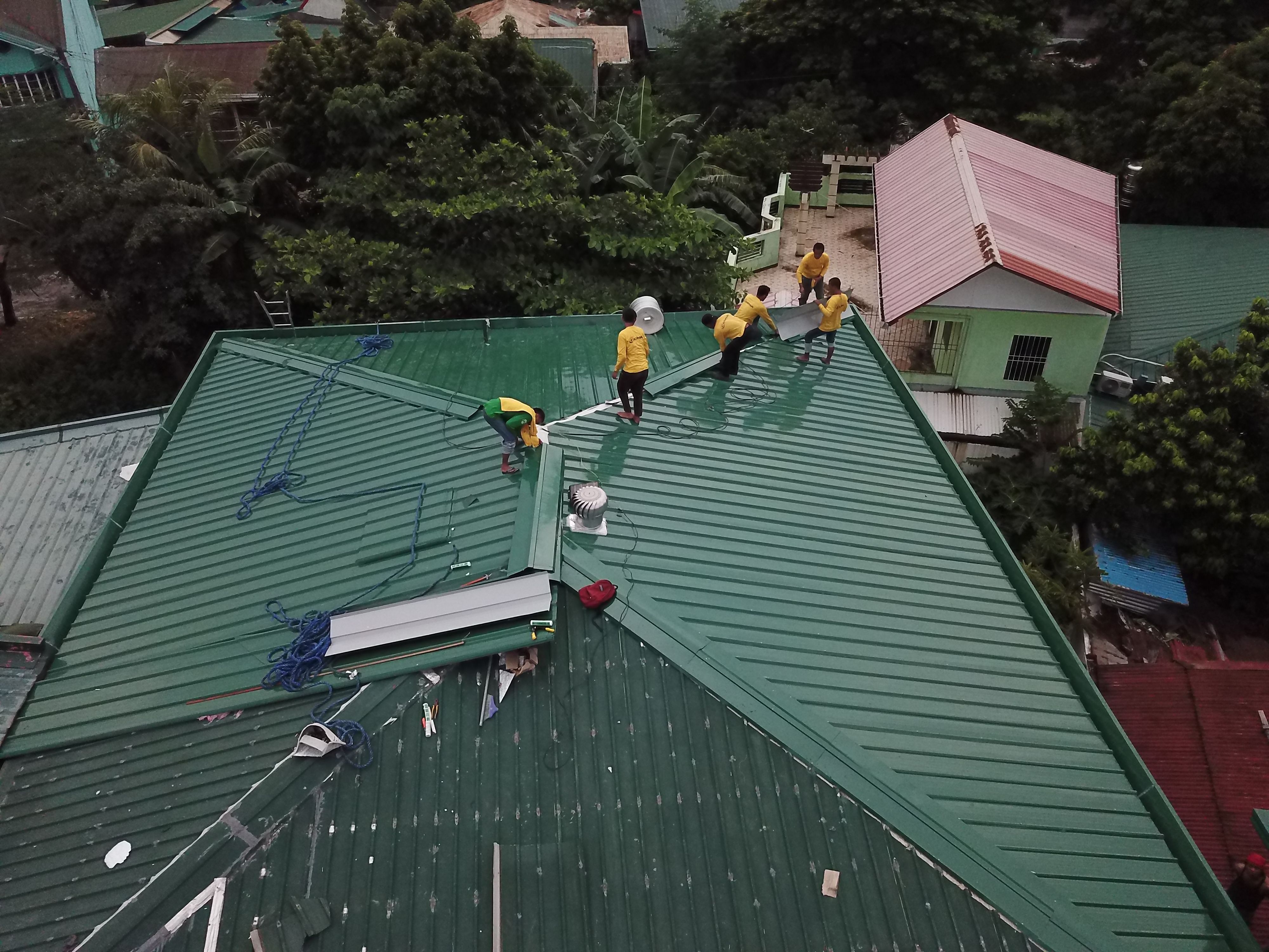 Professional roof waterproofing work on a UAE building